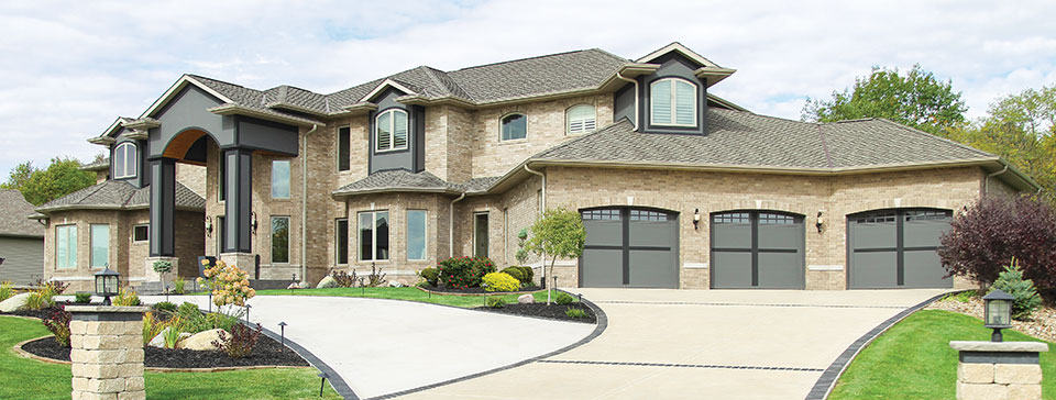 home with triple garage doors