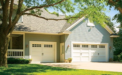 home with single and double garage doors